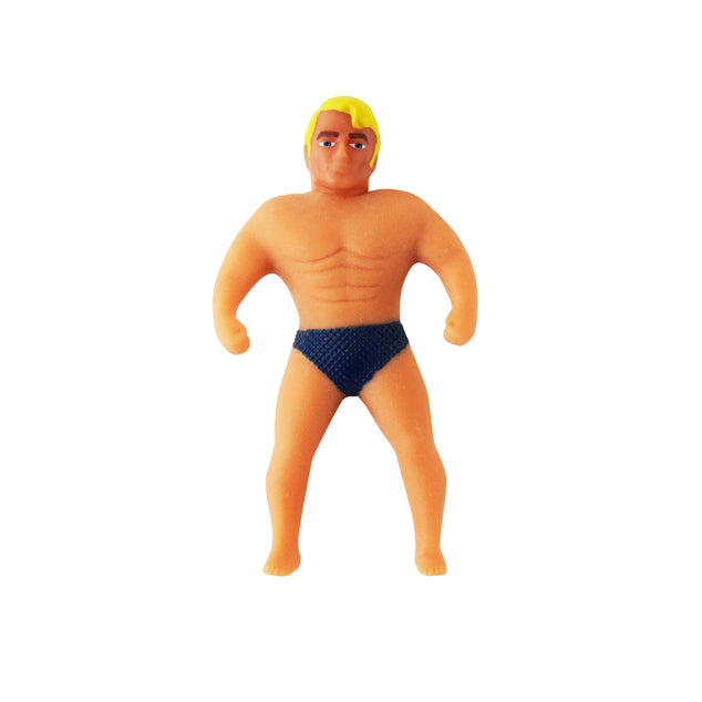 Miniature Stretch Armstrong action figure with blonde hair and black trunks, stretches up to four times its size and returns to original shape.